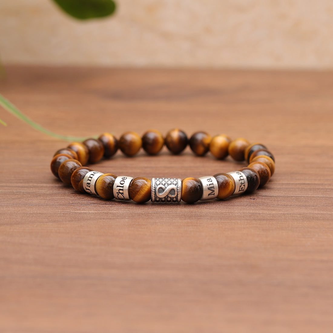 Sophisticated Tiger Eye Beads with Infinity Charm - Embodying Eternity and Elegance in Jewelry.