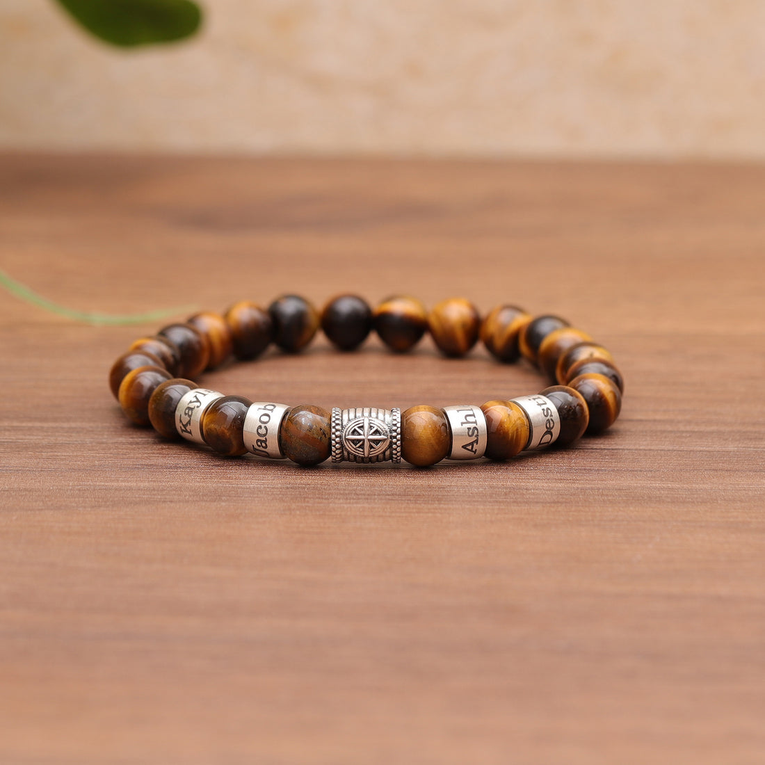 Handcrafted Bracelet with Tiger Eye Beads, Compass Charm, and Custom Engraved Beads.