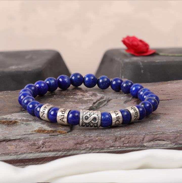 Engraved lapis lazuli beads bracelet with tree charm for men and custom family names, ideal Father’s Day gift.