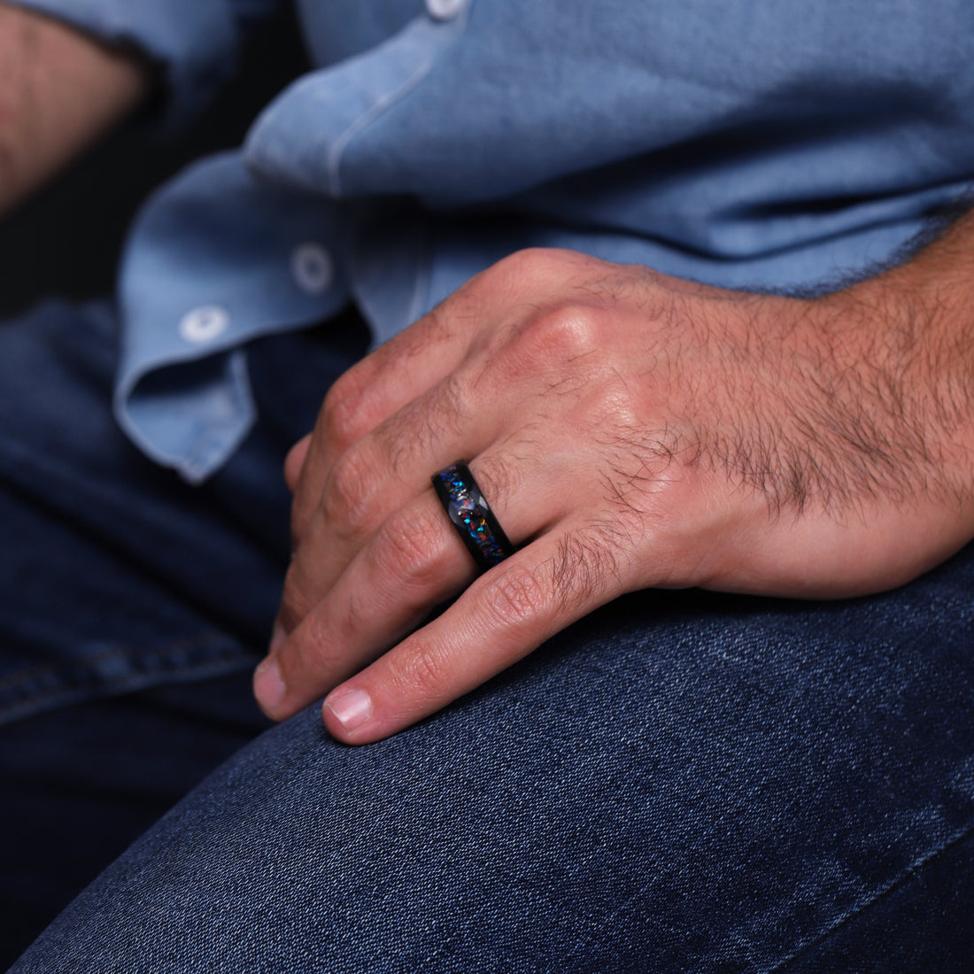 Men's 8mm black ring, intricately combining meteorite fragments and opal for a celestial look