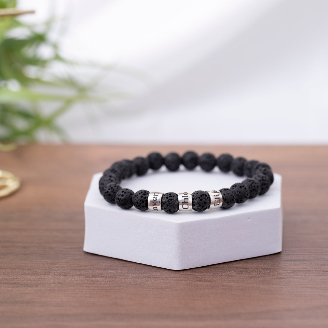 Men's lava bead bracelet, easily slipped on and off, personalized with names, perfect for symbolizing family strength and love on occasions like Valentine's Day