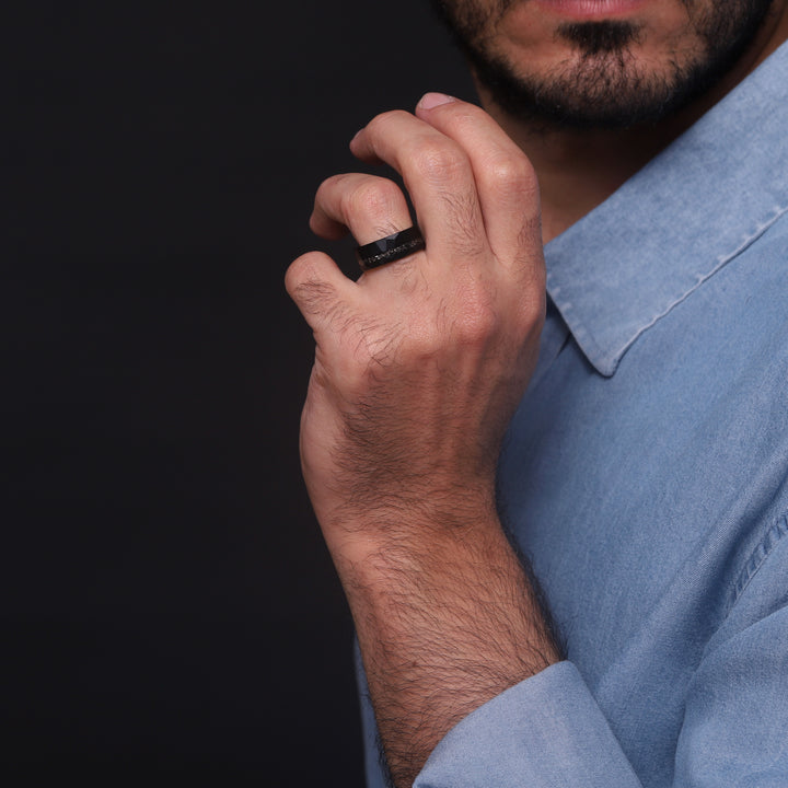 A striking custom gift for men who wear their style proudly – our Black Hammered Ring with Meteorite inlay