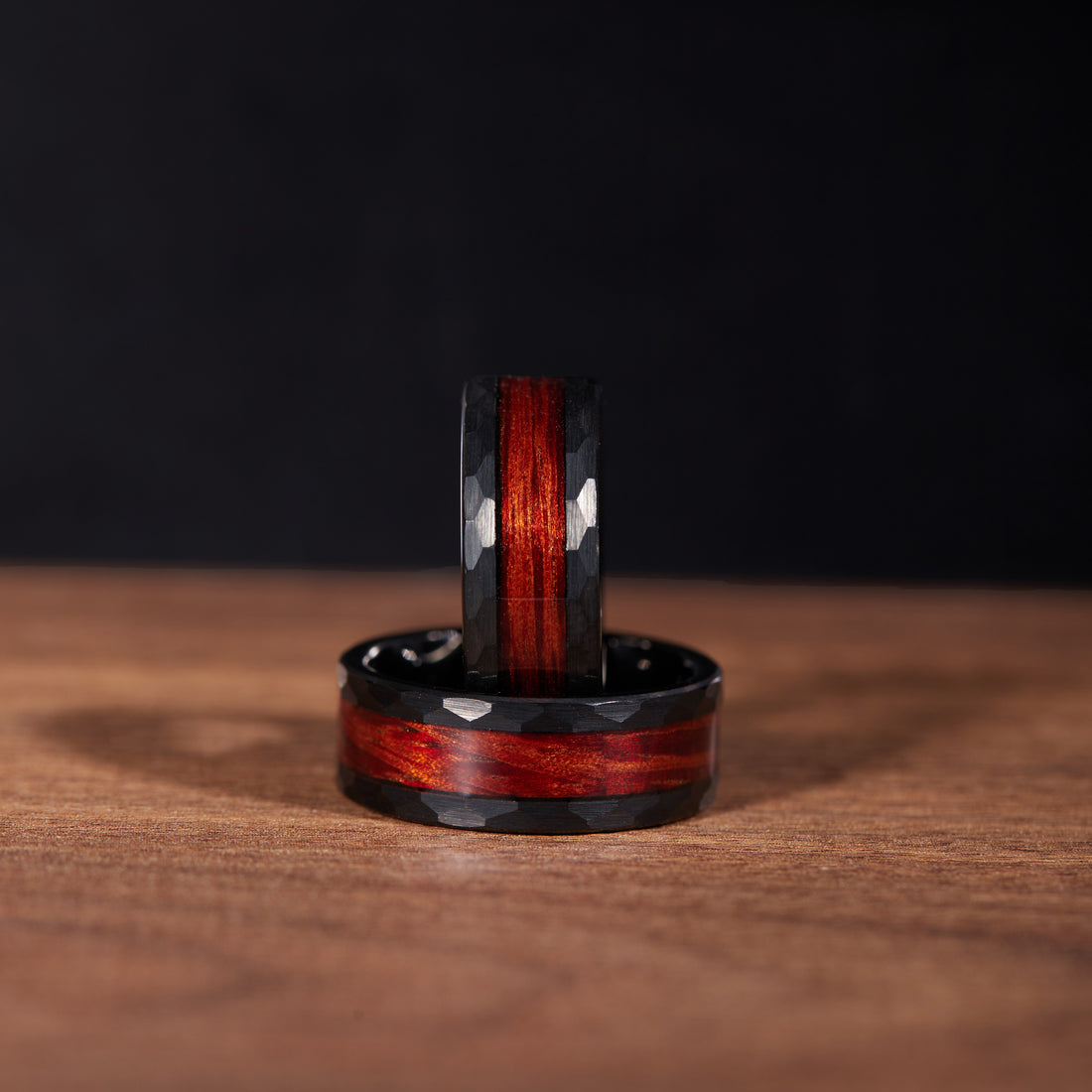 Durable and unique 8mm black tungsten ring with walnut wood inlay, ideal for a man's wedding band.